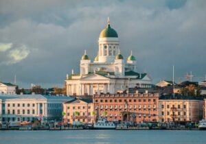 View of church across the waters in Helsinki, Finland - doing business in the EU