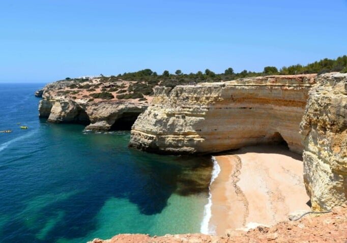 Rocky coastline of Algarve in Portugal - Portuguese beach town to retire in