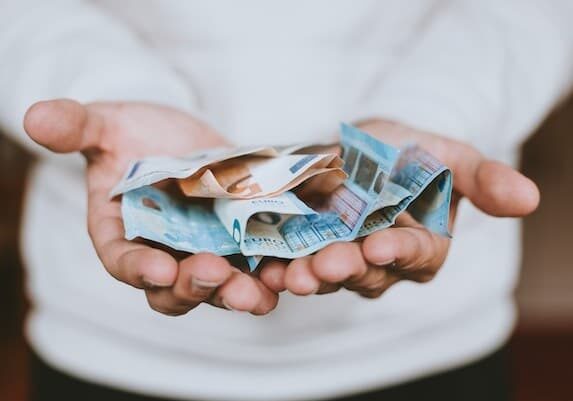A person holding money 