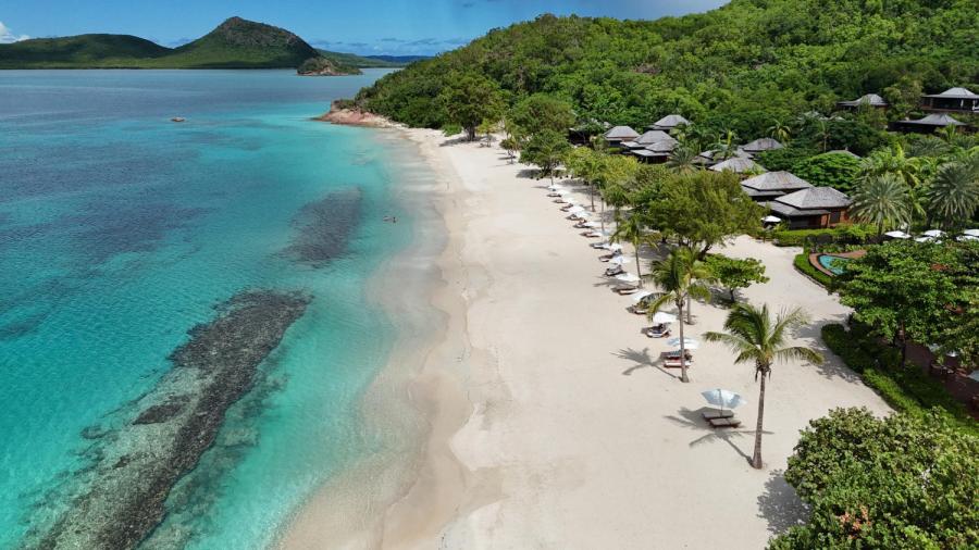 side view of a tropical beach and ocean in antigua and barbuda