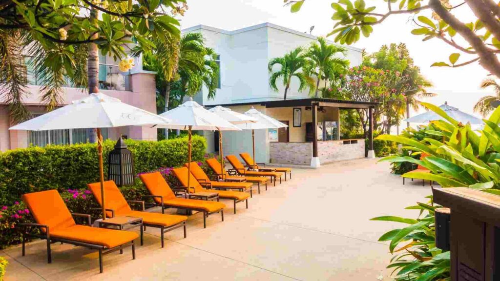 orange deck chairs at a resort in the caribbean