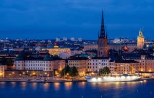 City in Sweden lit up at night - one of the best places to live for expats