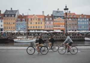Row of colorful houses along a river in Denmark - Top English-speaking countries
