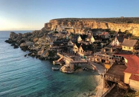 Malta shoreline on a dusky afternoon - residency by investment in crypto-friendly country
