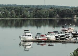 waterfront in canada with boats and trees
