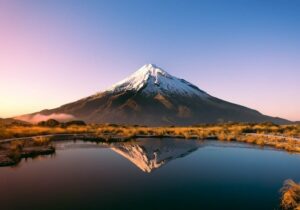 Snowcapped Mount Taranaki in New Zealand at sunset - top healthcare for expats in Oceania