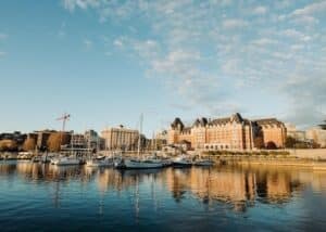 buildings near a water front with blue sky the best places to retire in Canada