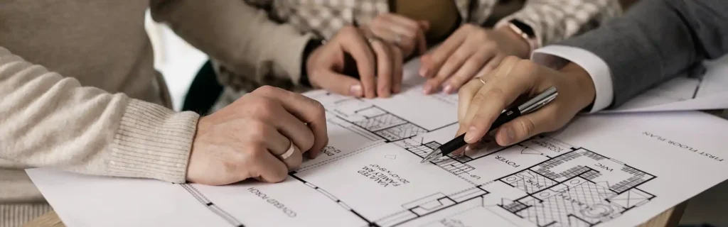 people in a meeting about real estate