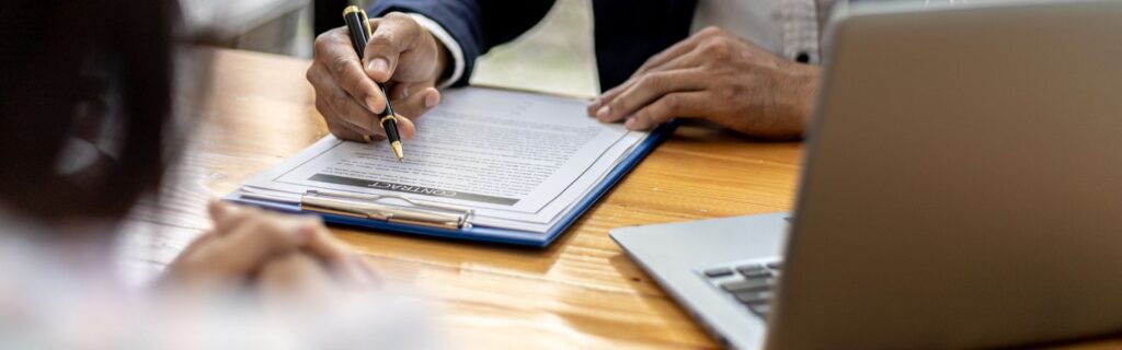 a person completing an application 