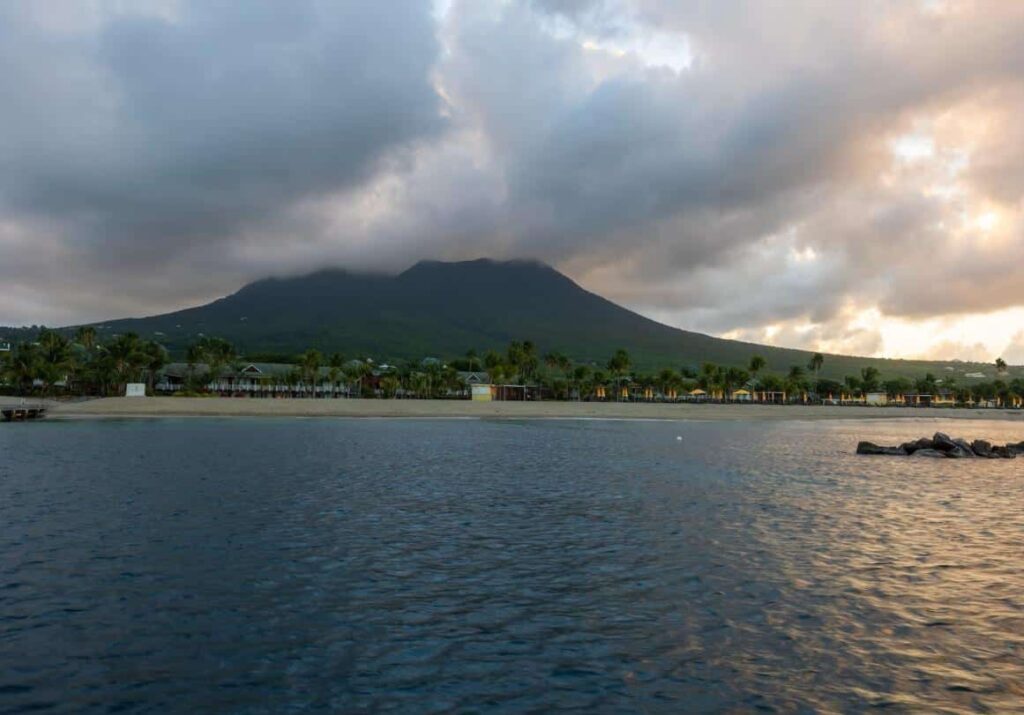 Mountain covered with clouds on island of St Kitts - no income tax countries