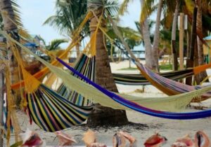 Hammocks on a beach in Belize - no capital gains tax rate