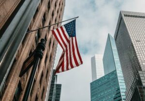 usa flag with buildings