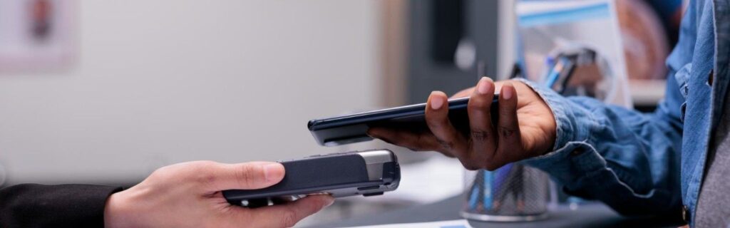 a customer banking in antigua using a payment terminal