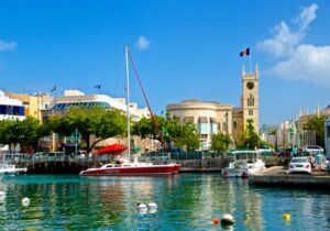 View of harbor in Barbados on a bright day with boats moored - islands for Americans to move to