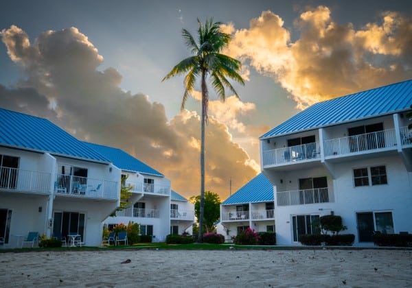 Blue roofed houses on a Caribbean island - Citizenship by Investment
