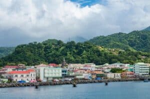view from the sea of domincan buildings and mountains