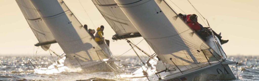 two boats racing at Carriacou Regatta Festival