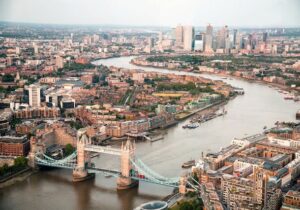 Aerial view of tower bridge and the river Thames in the UK - best European country for Indians to immigrate to