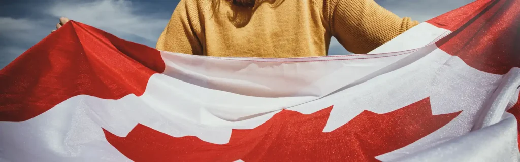 Woman holding a Canada flag