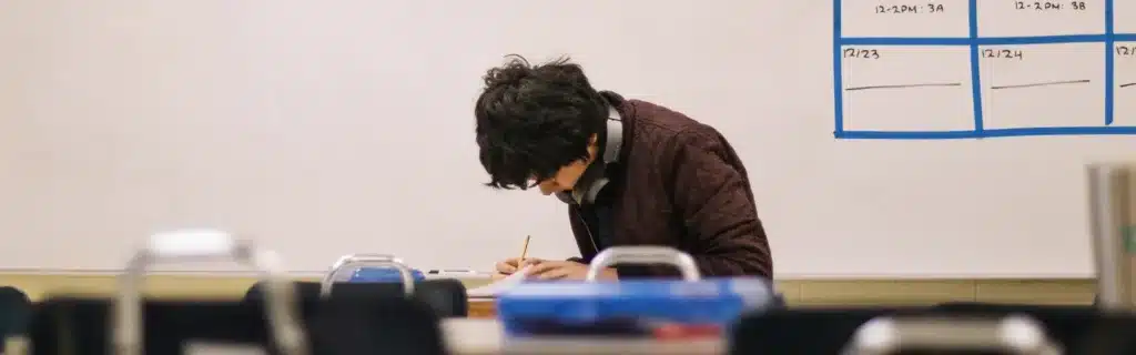 young man studying under the UAE Student Golden Visa