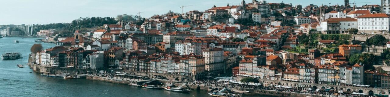 Docks and boats in the city of Porto, Portugal, along to Douro River