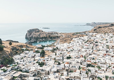 Aerial view of Rhodes in Greece with shoreline in the background - best retirement places
