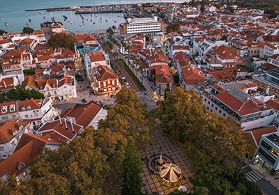 Aerial view of downtown Cascais in Portugal, where the real estate has higher property taxes but a view of the atlantic ocean