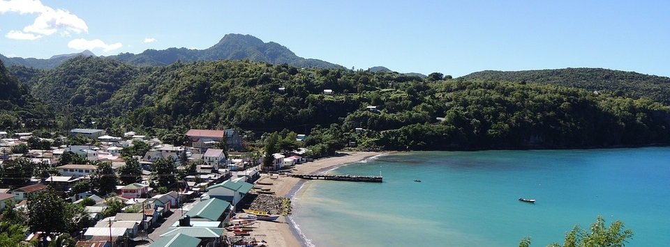 view of buildings on a beach in the caribbean