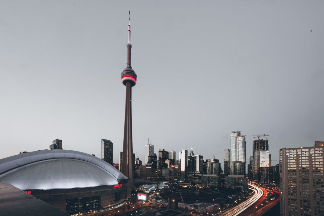 evening view of cn tower and buildings in toronto