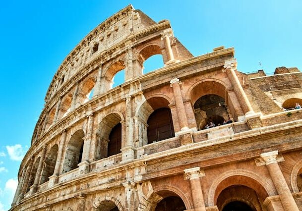 colosseum in ialy in a blue sky