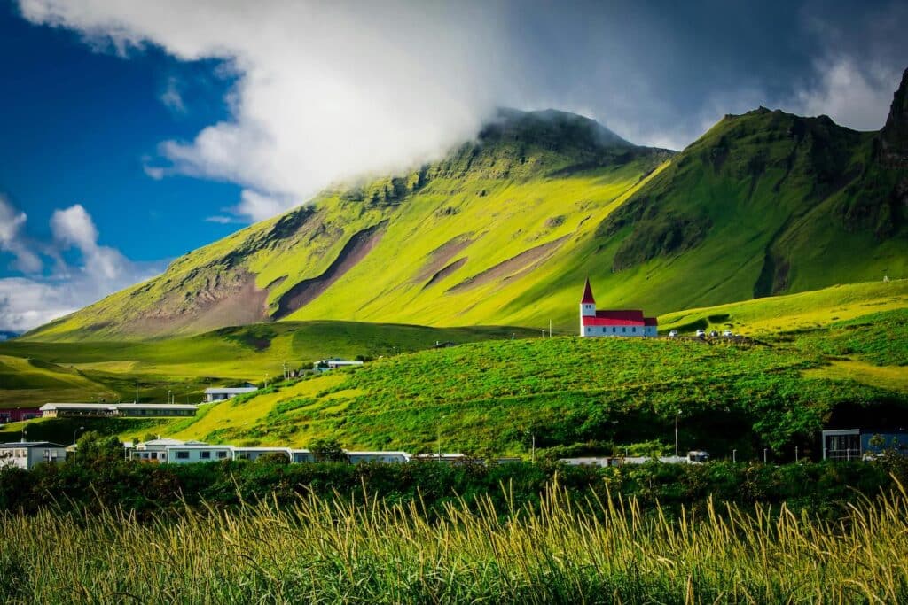 Green countryside in Iceland - best countries to raise a family