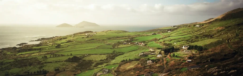Misty green hills in Ireland - easiest countries to get citizenship
