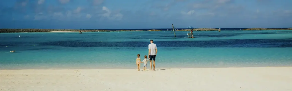 Family in a beach in The Bahamas