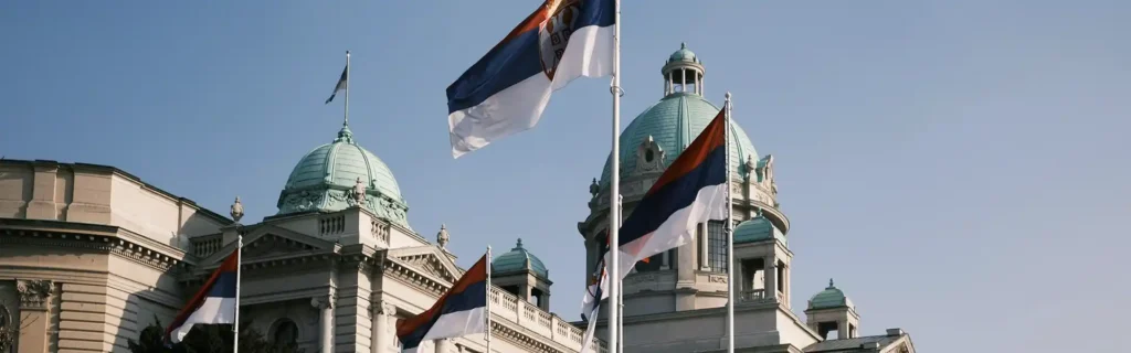 building and Serbian flags